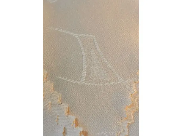 Obrus plamoodporny 130x160 cm wzorek budyniowy owal